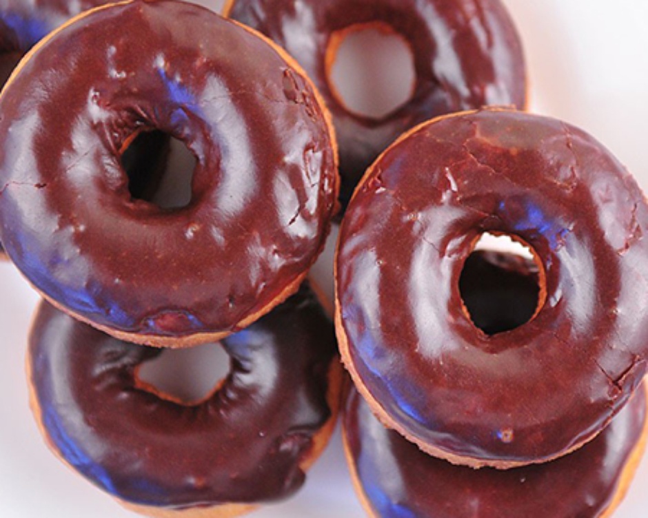 top view of chocolate frosted doughnuts 